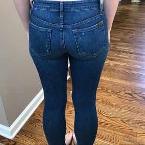 Navy blue dark skinny ripped jeans.